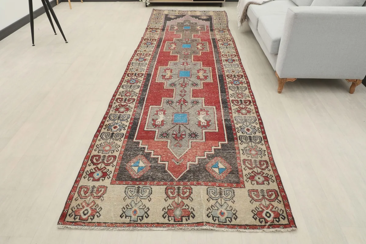 Full overhead view of the 4'0" x 12'6" vintage Anatolian runner in a room setting