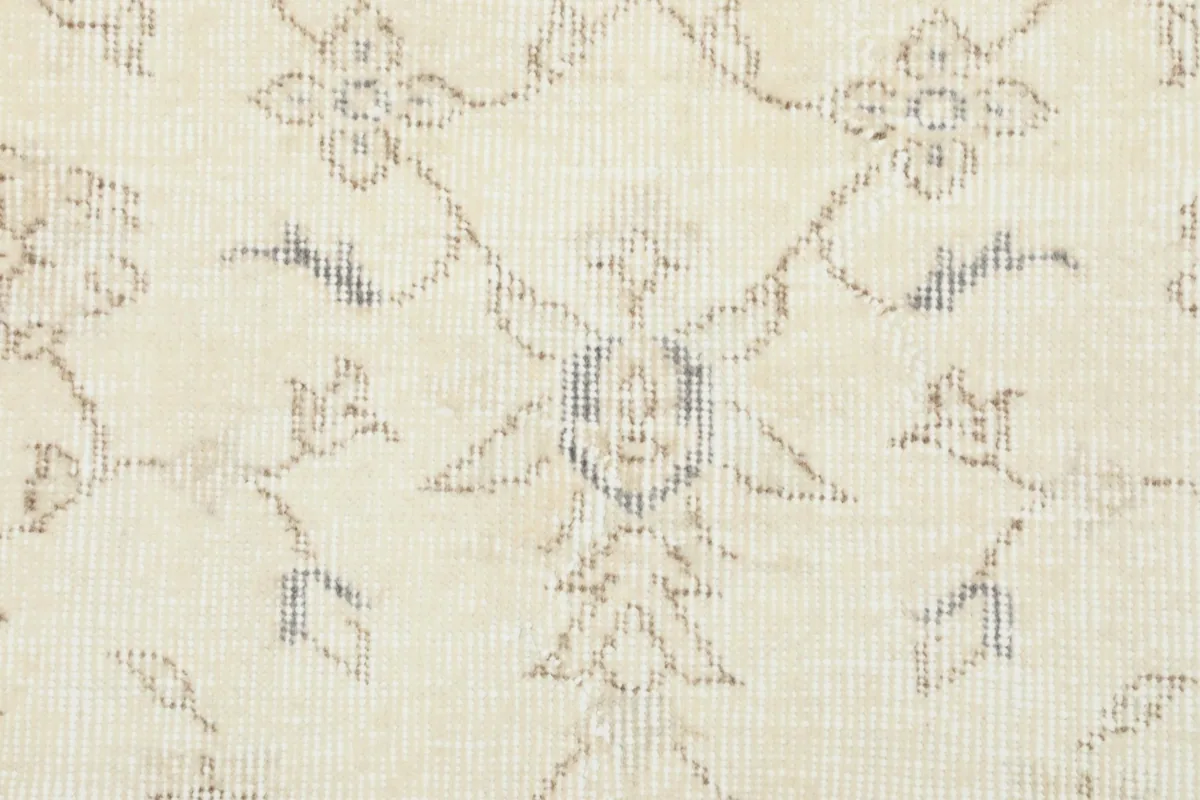 Detail of the rug's low pile and the texture of the hand-knotted wool