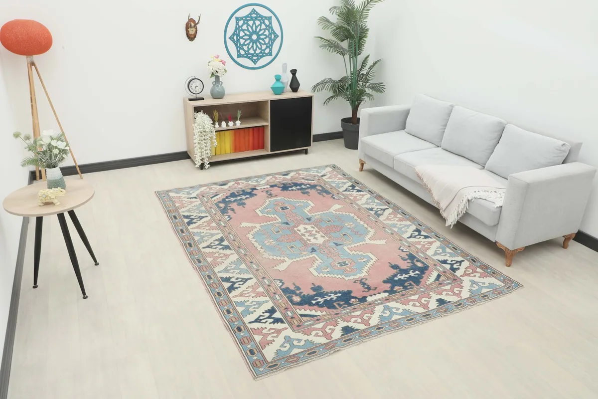 Vintage Anatolian rug in a modern living room setting with a light-colored sofa