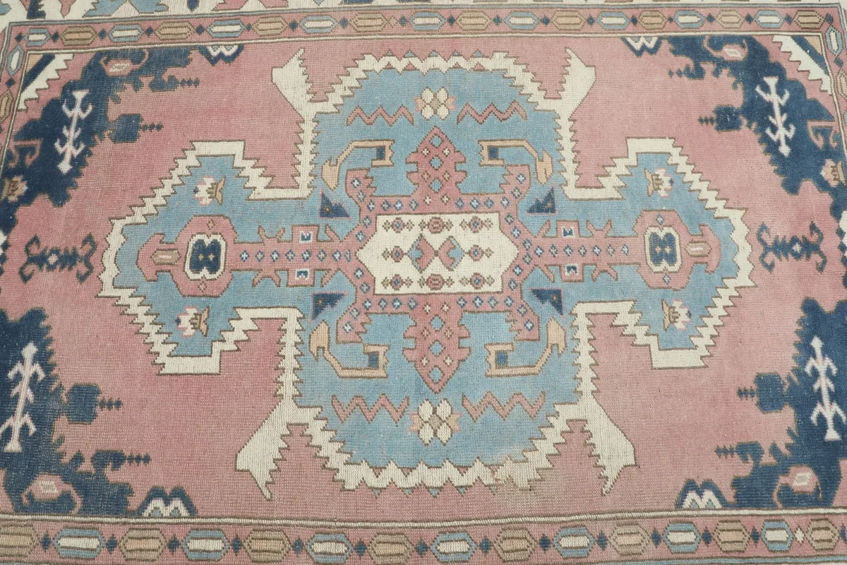 Detailed overhead view of the central medallion and surrounding geometric motifs