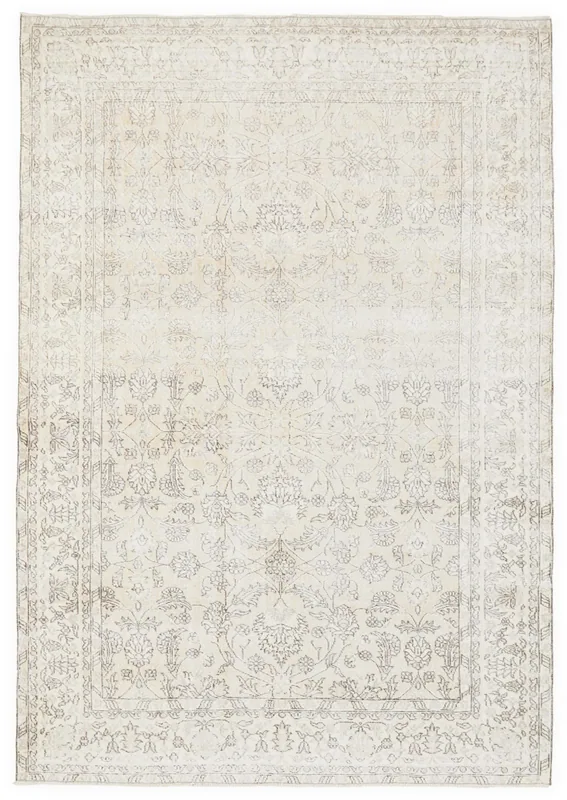 Full overhead view of the ivory and gray vintage Anatolian area rug with floral patterns