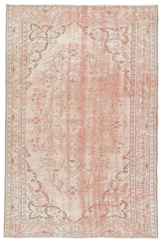 Full top view of the 6'3" x 9'4" vintage Anatolian area rug with rose and beige colors