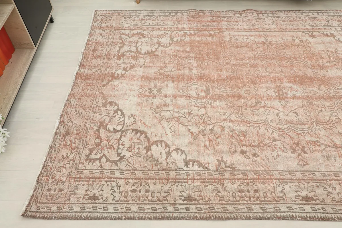 Another corner perspective of the hand-knotted Anatolian rug with its soft color palette