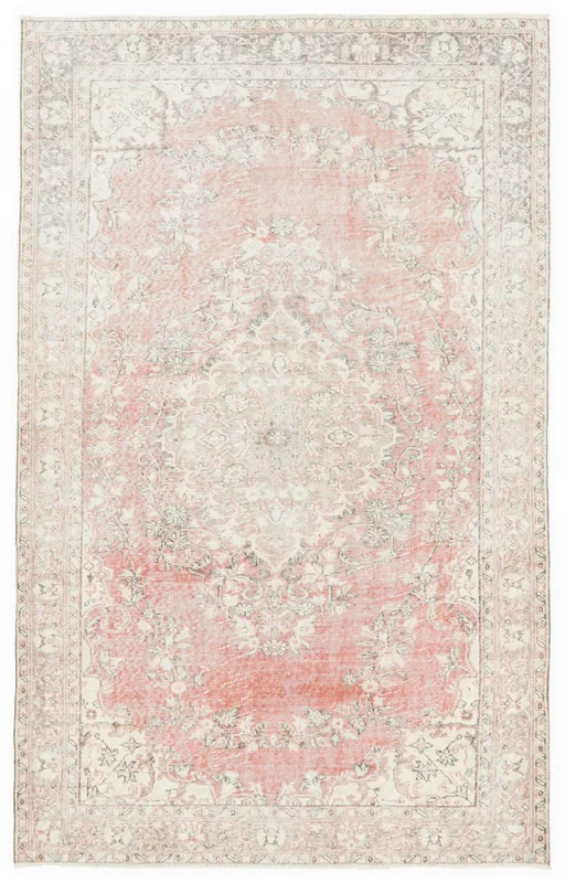 Full overhead view of the vintage rose medallion area rug on a white background