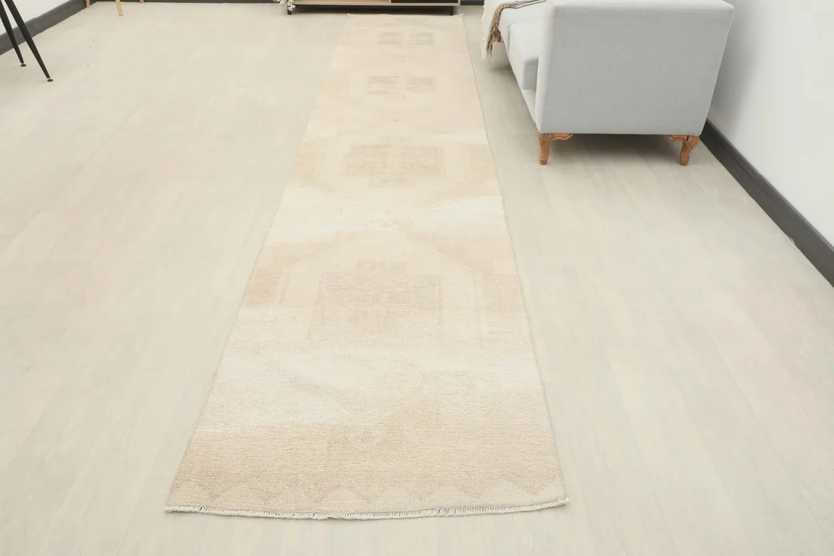 Full view of the runner rug in a room, showing its overall appearance and how it fits the space.