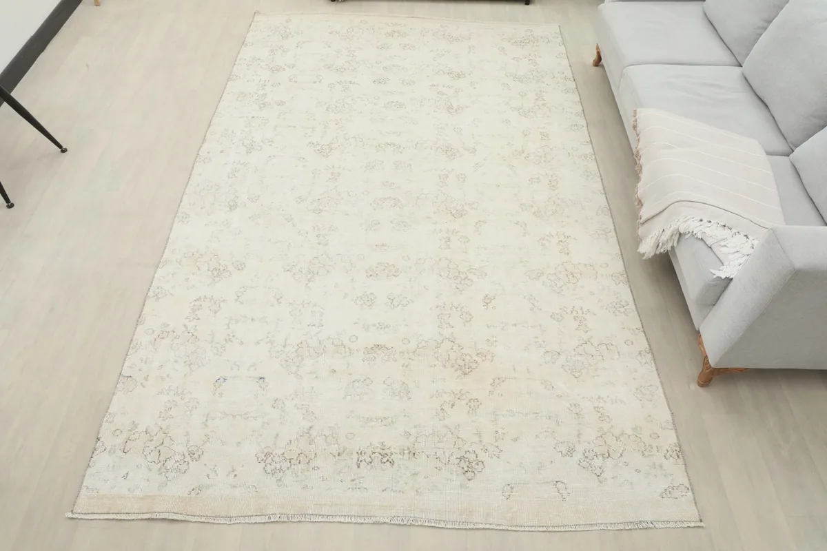 Full room view of the large ivory area rug, showcasing its placement and size in a living space