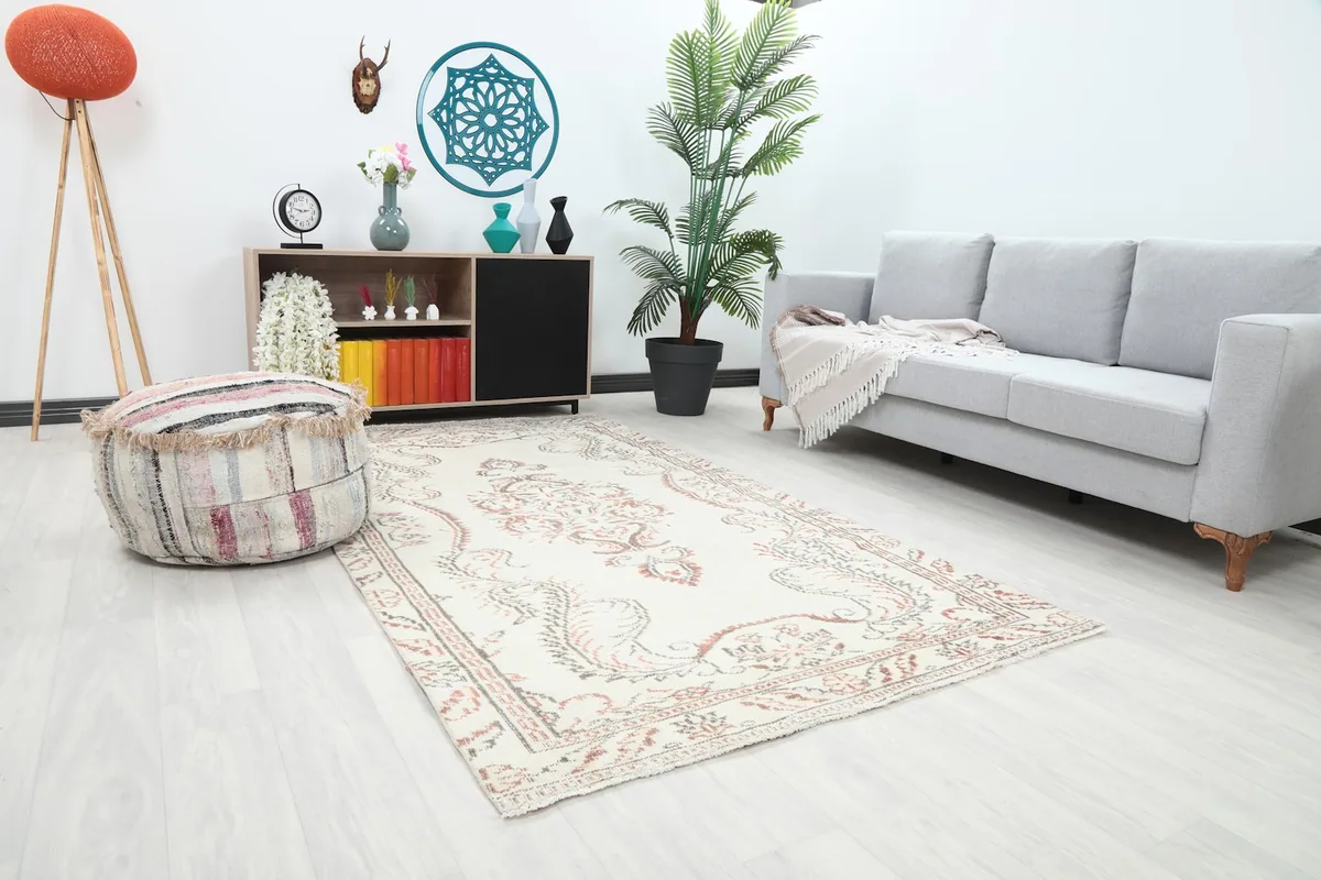 Angle view of the hand-knotted rug in a modern living space, highlighting its unique character.