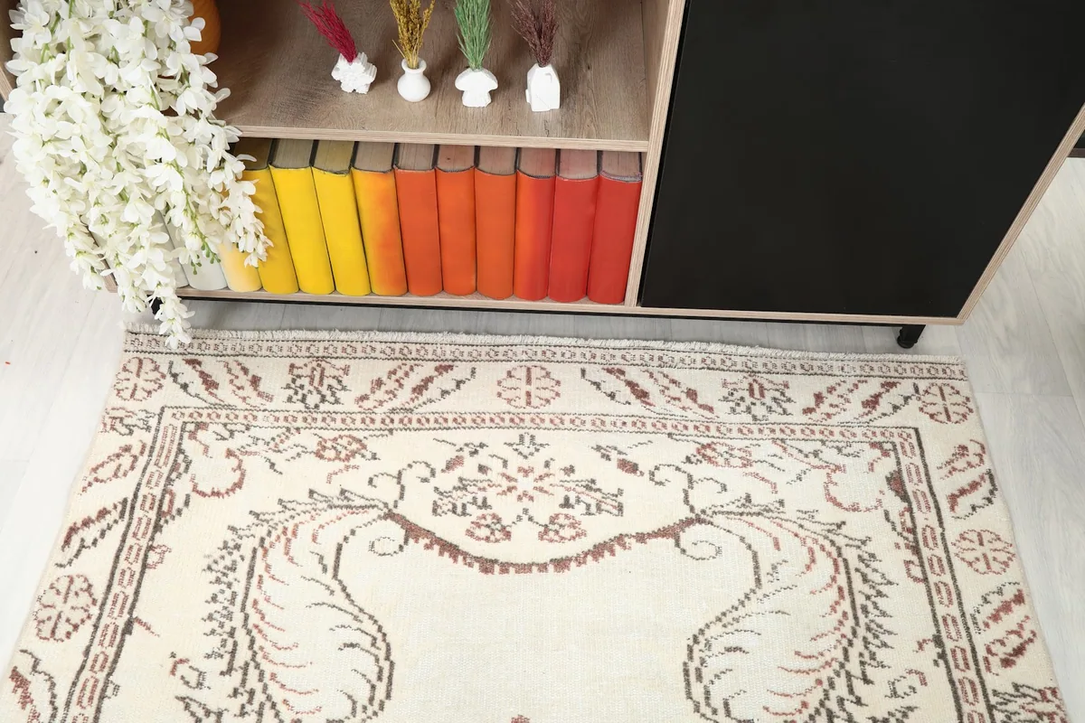 Detail from an overhead perspective, focusing on the border and central medallion design.