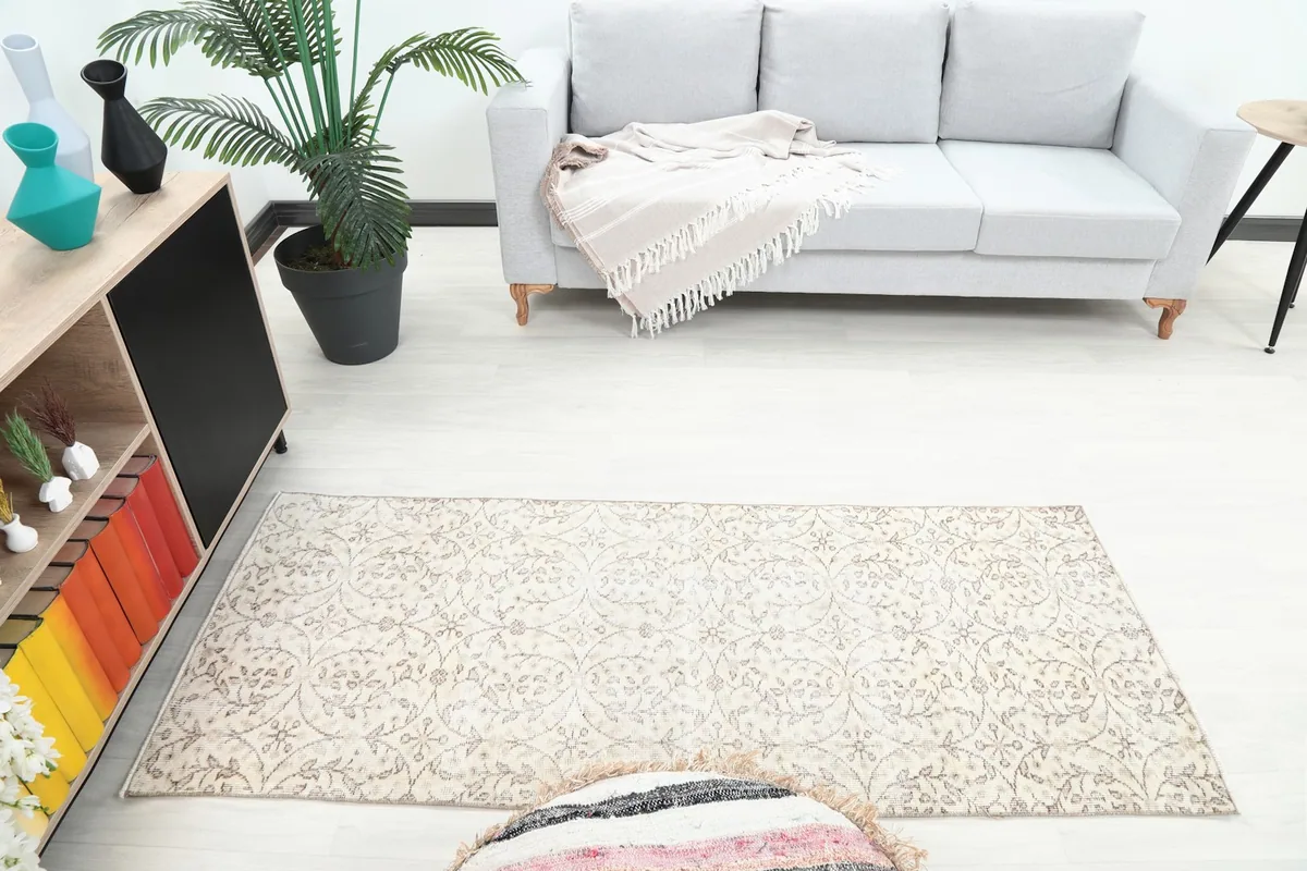 Overhead view of the runner rug in a room, showing its placement in front of a sofa.