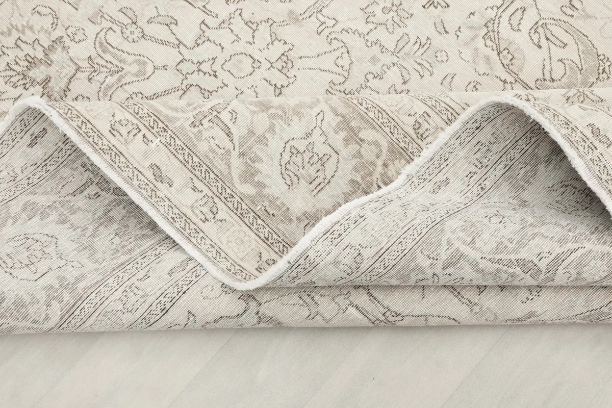 Another folded view showing the thickness of the rug and the tightly woven backing