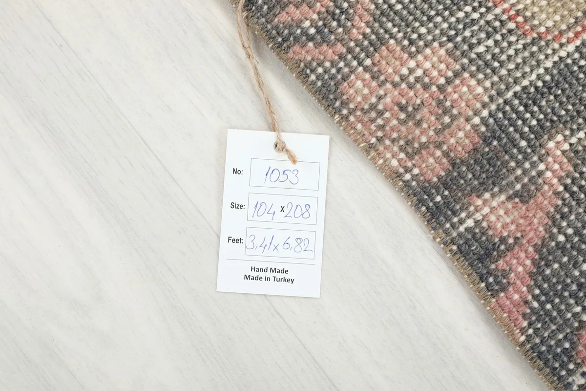 Product tag on the rug, indicating its size and origin from Turkey