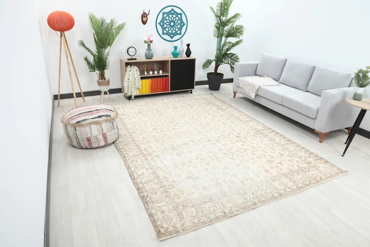 Angled view of the ivory and gray Anatolian rug in a modern living space