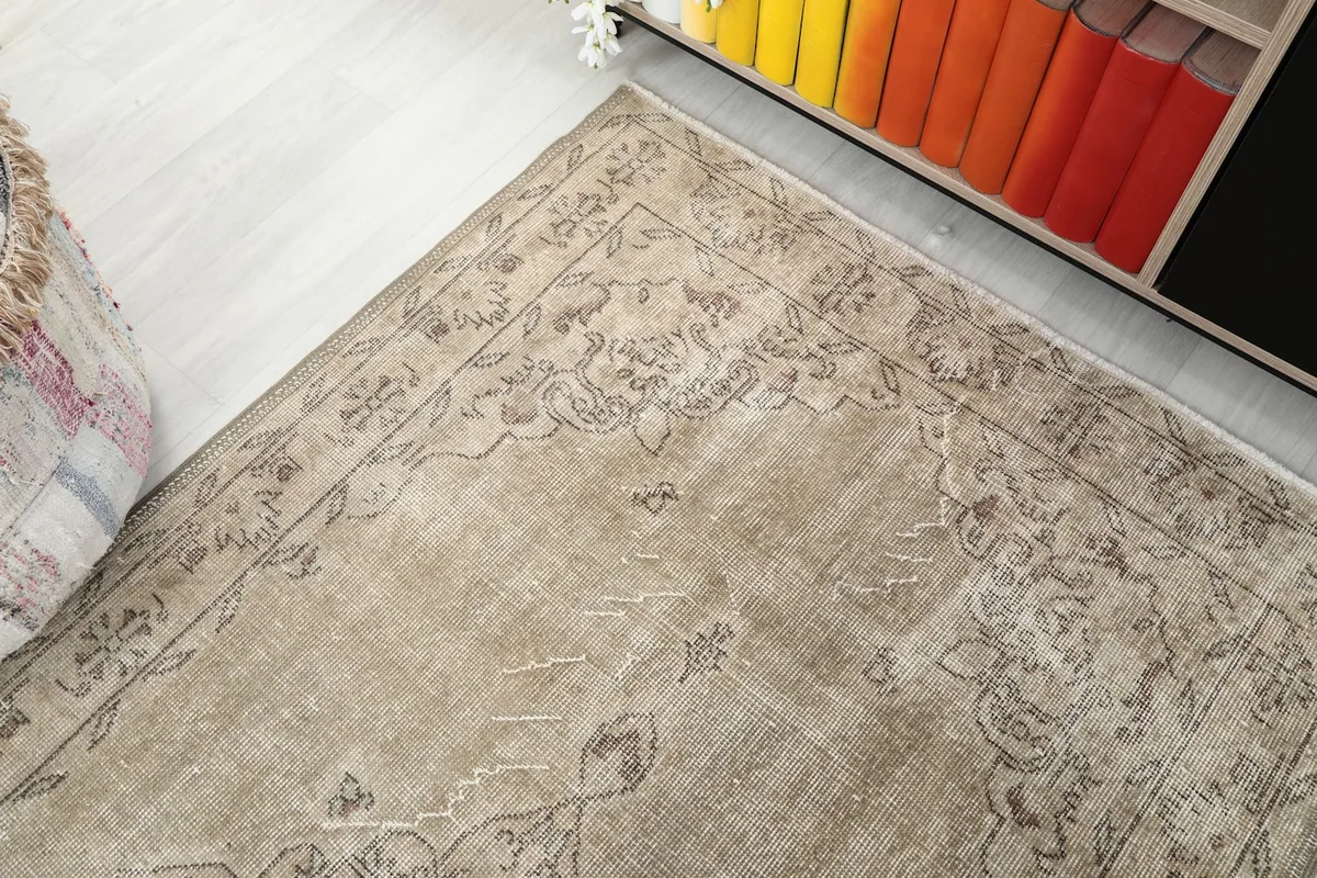 Top-down angle showing the upper portion of the rug and its border design