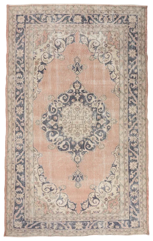 Full top view of the vintage rose and navy Anatolian area rug