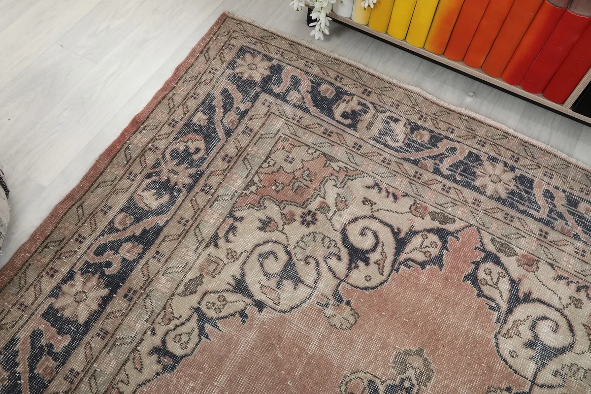 Overhead angle of the rug's top corner, showing the border and field design
