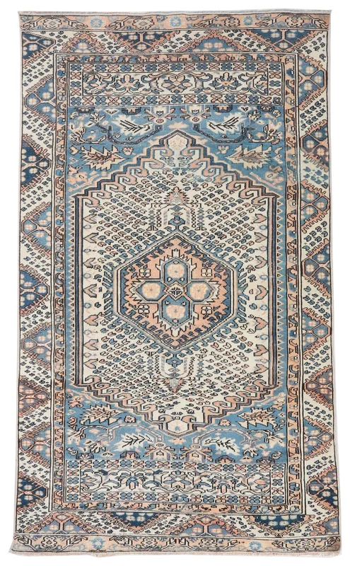 Full top view of the 4'3" x 7'3" beige floral Anatolian rug on a white background.