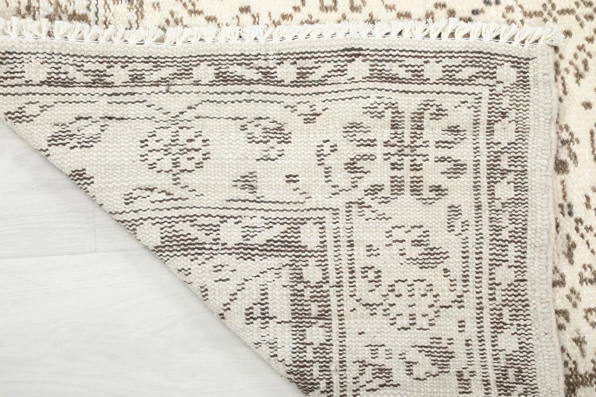 Another view of the rug's back, showing the consistent hand-knotted construction