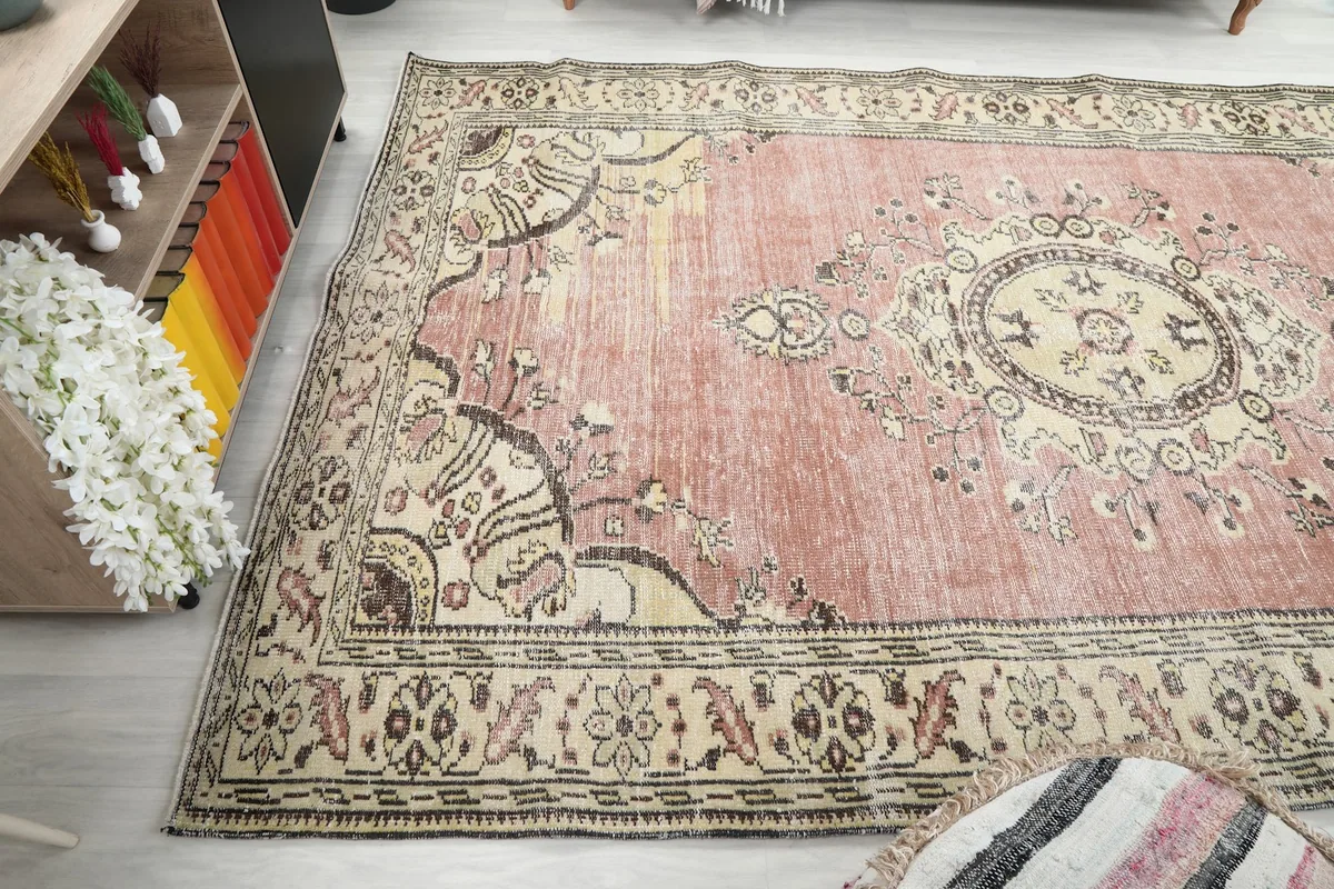Angled shot showcasing the full length and width of the large area rug in a room