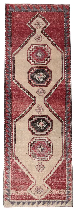 Full overhead view of the 3'8" x 11'2" vintage Anatolian runner rug with red and beige geometric patterns.