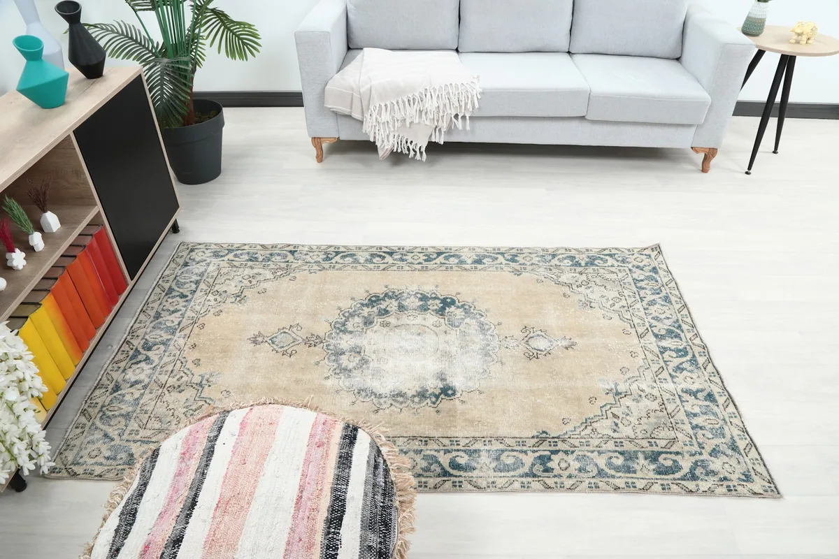 Overhead room view of the vintage runner rug, showing its full length and design.