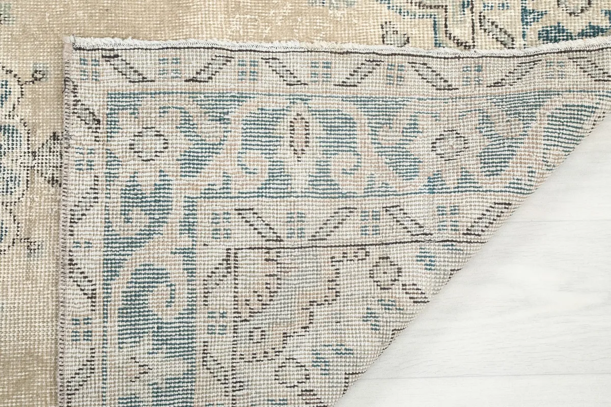 Close-up of the back of the rug, showing the consistent hand-knotting and foundation.