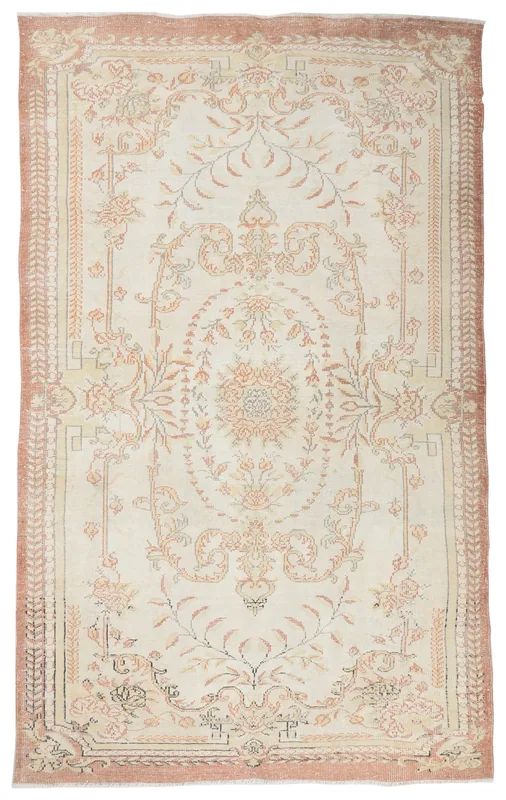 Full top view of the ivory and rust floral medallion vintage Anatolian rug