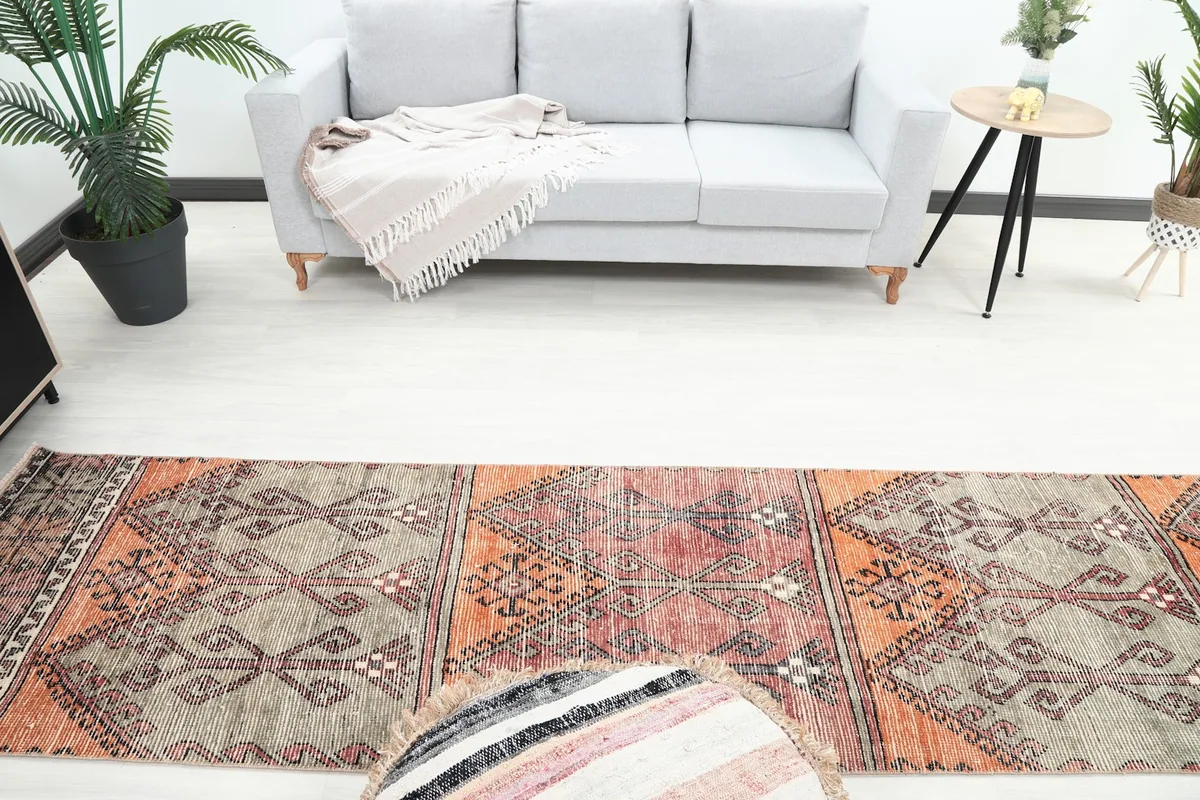 Overhead view of the runner rug stretching across a room, showing its full design