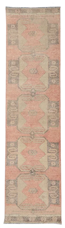 Full top view of the 2'11" x 11'8" vintage rose and beige tribal runner rug on a white background.