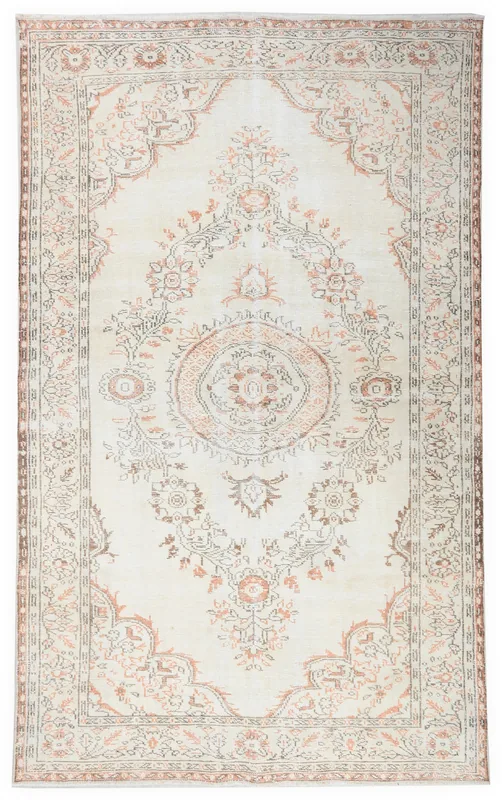 Full top view of the ivory and rust Anatolian vintage rug with a central medallion