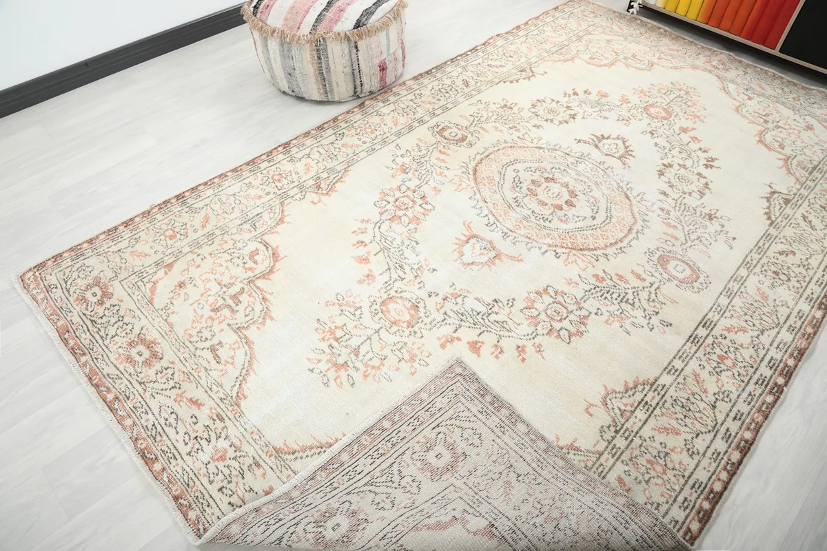 View showing a folded corner of the rug, illustrating its thickness and construction
