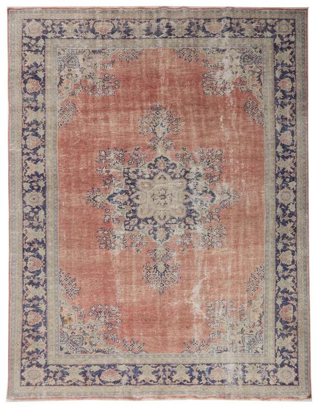 Full overhead view of the rust and navy vintage Anatolian area rug