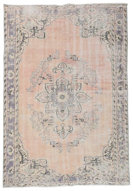 Full overhead view of the rose and gray vintage Anatolian area rug