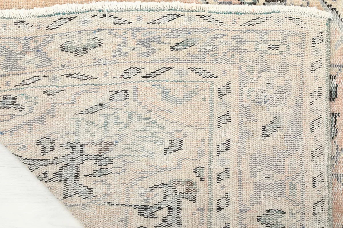 Close-up of the low pile texture and weave of the vintage Anatolian rug