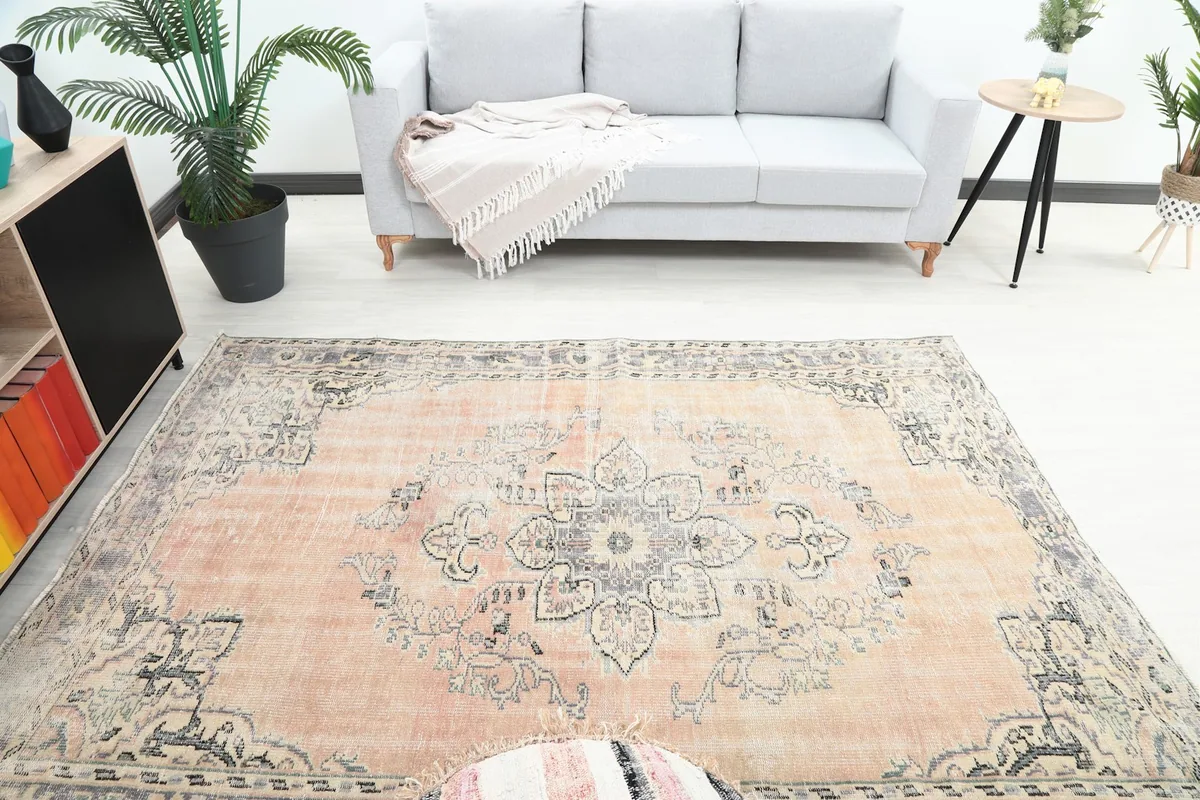 Overhead view of the rug in a room, highlighting the central medallion and overall pattern