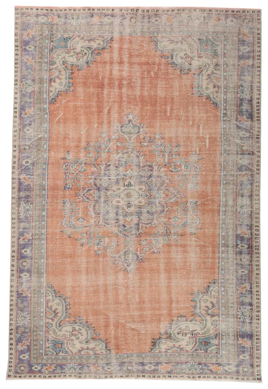 Full overhead view of the rust and blue medallion vintage Anatolian rug