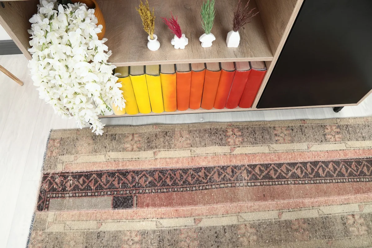 Detailed overhead shot of the runner rug's central design and color variations.