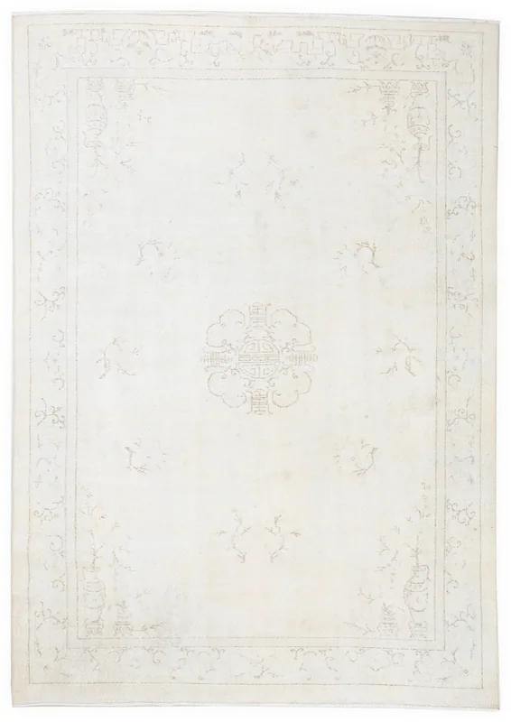 Full overhead view of the 6'6" x 9'5" ivory gold medallion vintage Anatolian rug