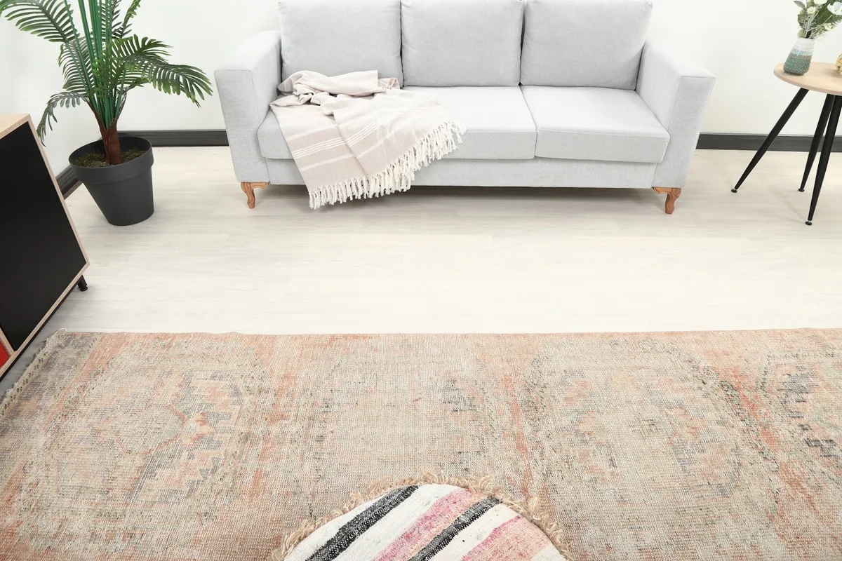 Overhead view of the runner rug in a room, showing its central placement and surrounding furniture.