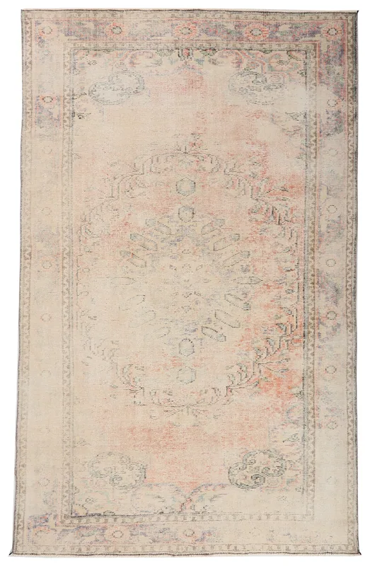Full top view of the ivory and rose geometric Anatolian vintage area rug