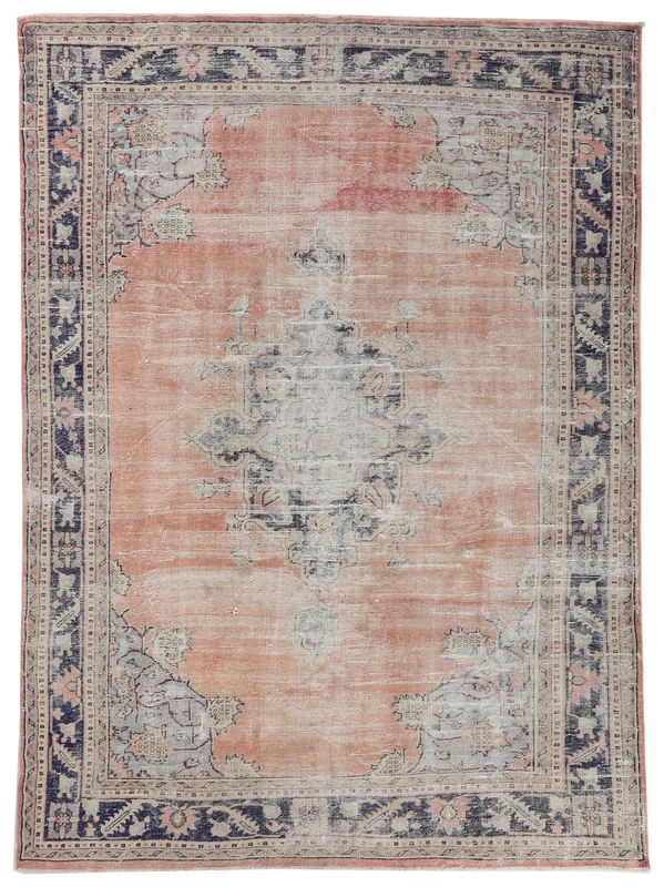 Full overhead view of the vintage rose and navy Anatolian area rug.