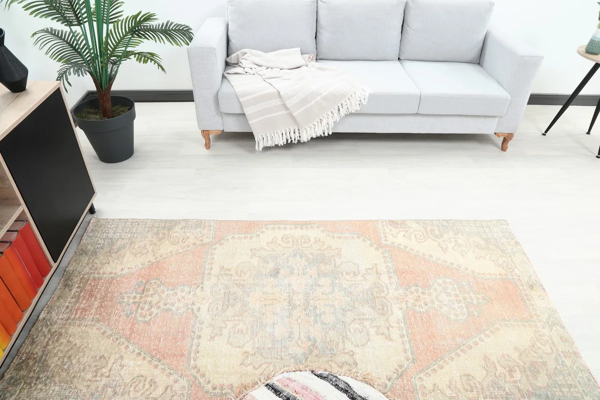 Overhead view of the rug in a room, showing its placement relative to furniture