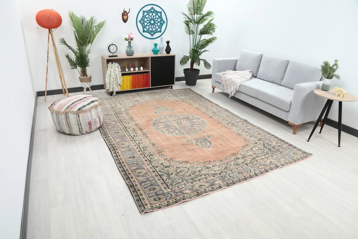 Angle view of the orange and gray Anatolian rug in a contemporary living space
