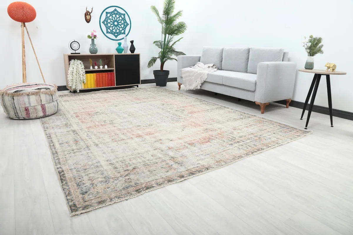 Overhead angle of the vintage Anatolian rug in a room, showing its full size