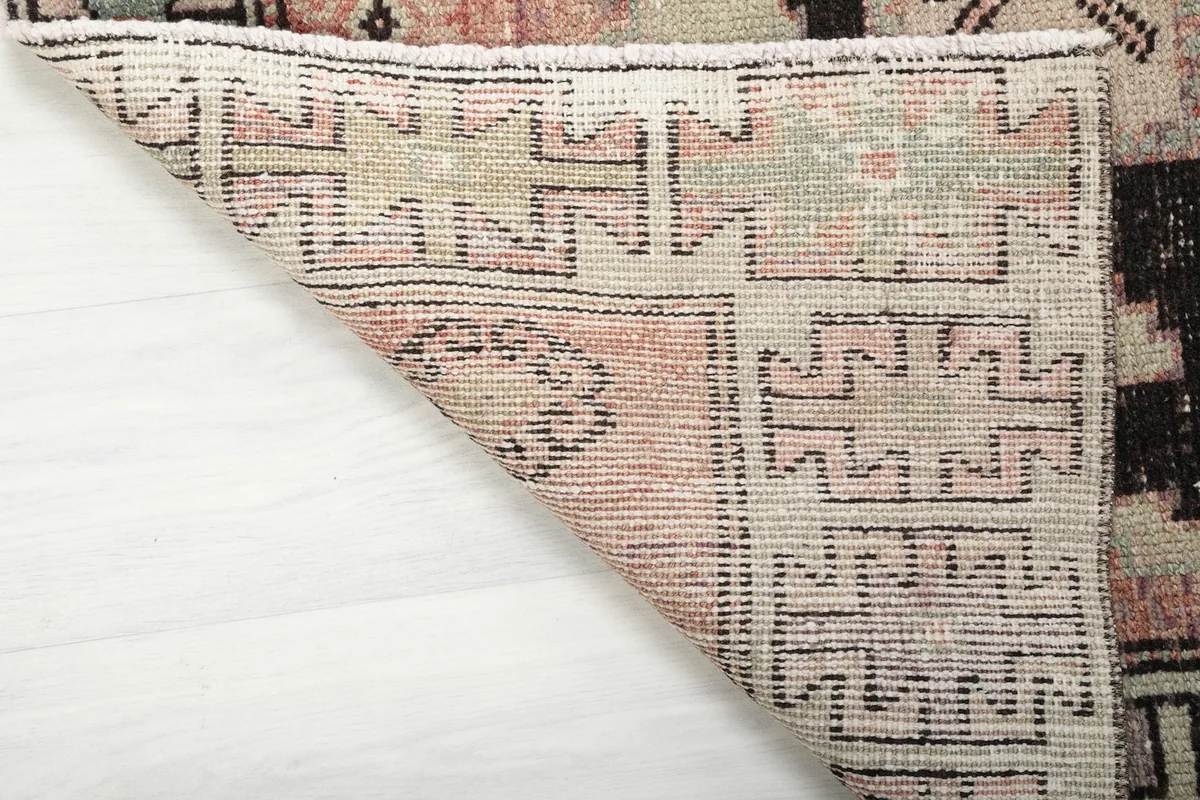 Underside view of the Anatolian runner rug, revealing the tightly hand-knotted cotton foundation and wool pile.