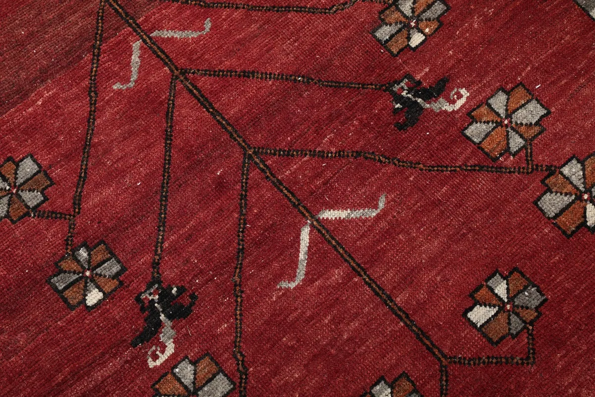 Close-up of the low wool pile, showing texture and subtle color variations.