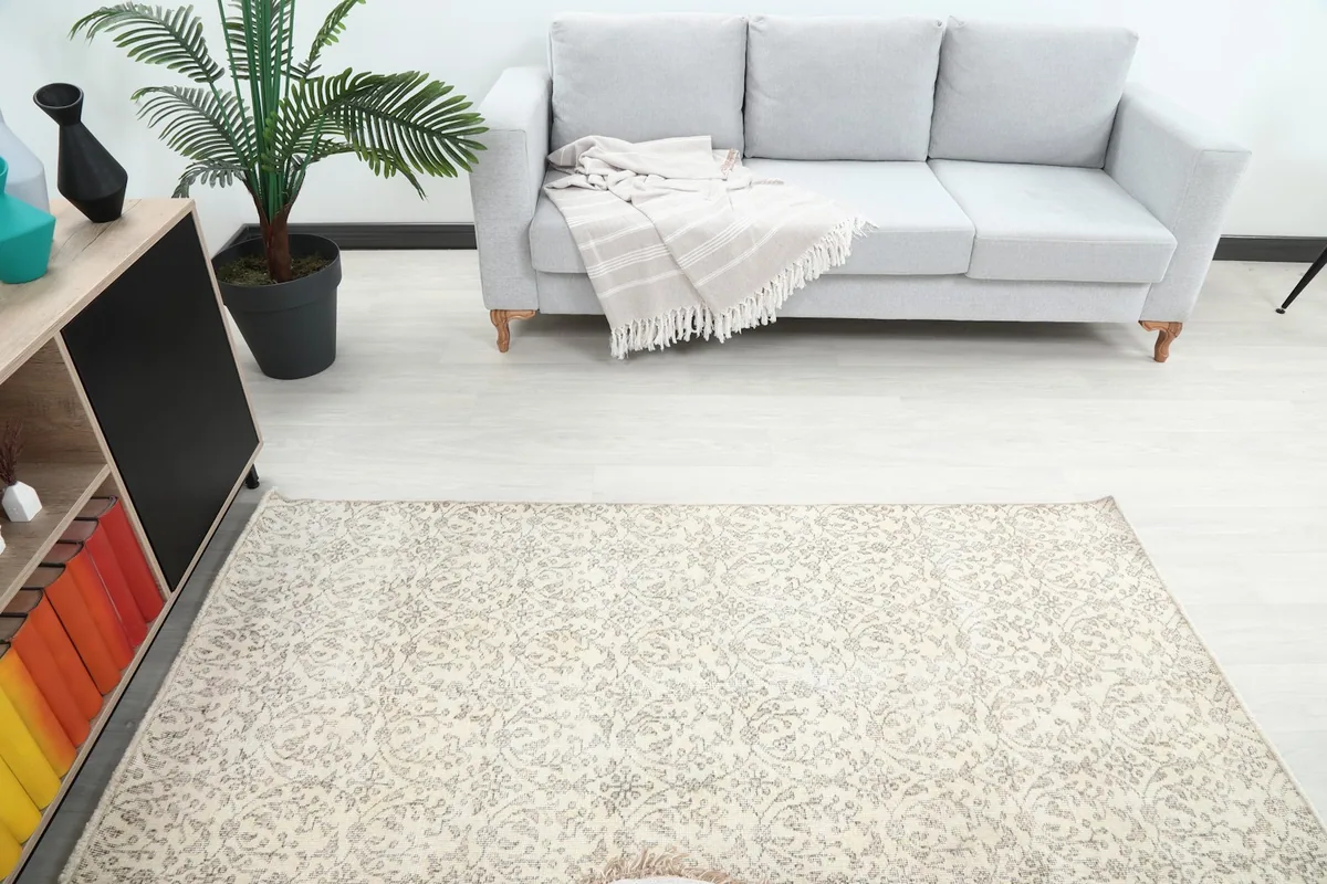 Overhead view of the rug in the room, showing its length and how it complements the light-colored flooring.