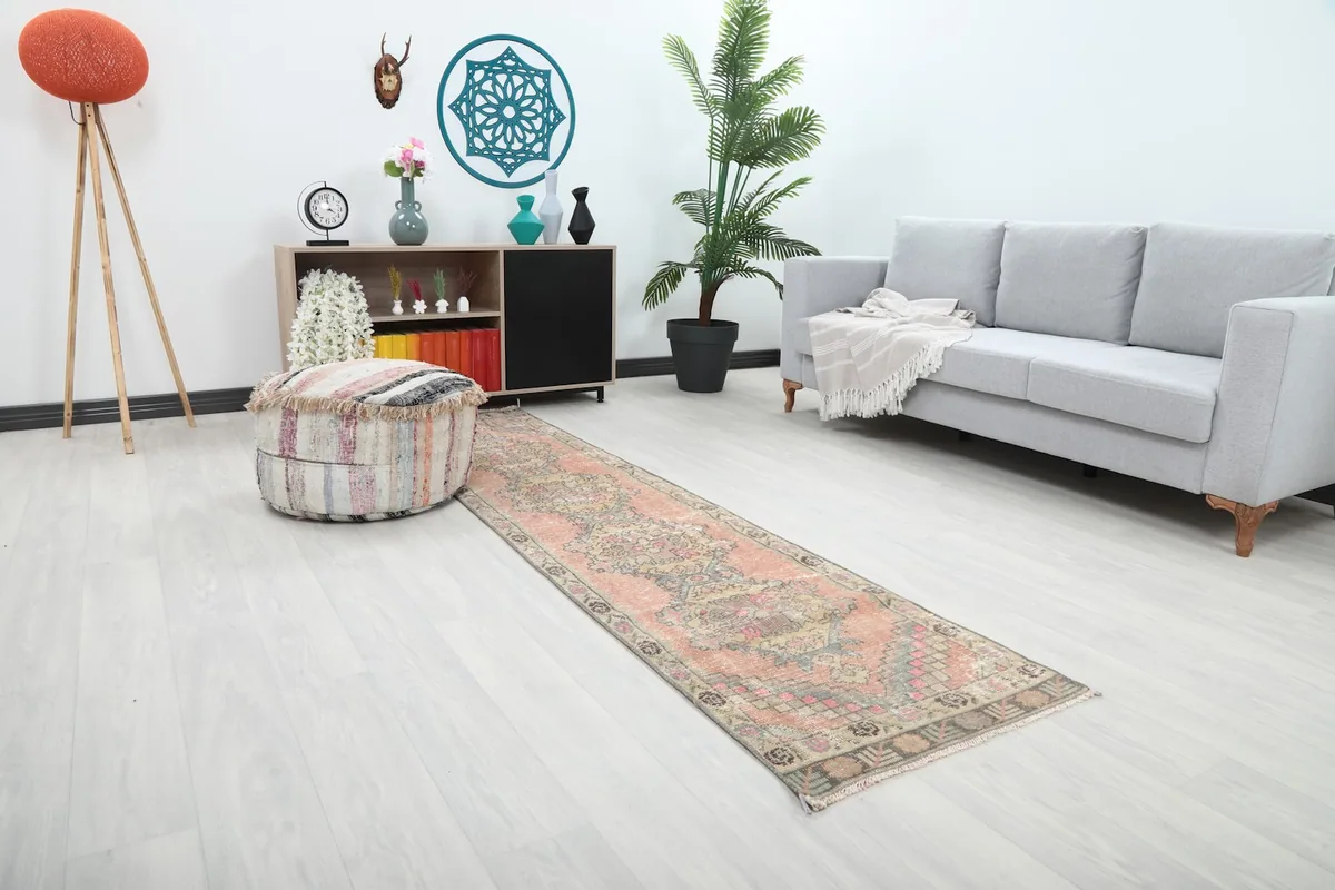 Angle view of the Anatolian runner rug in a room, highlighting its length and colors
