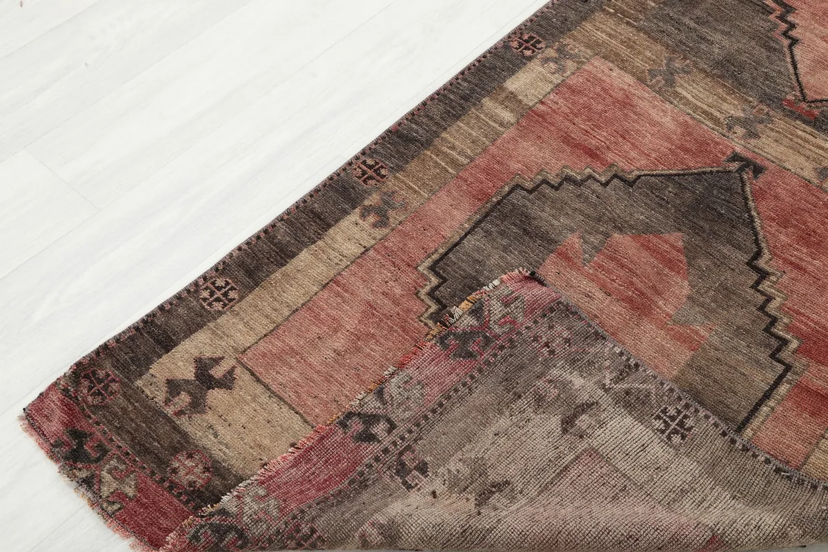 View of the runner rug partially folded, illustrating the flexibility and construction