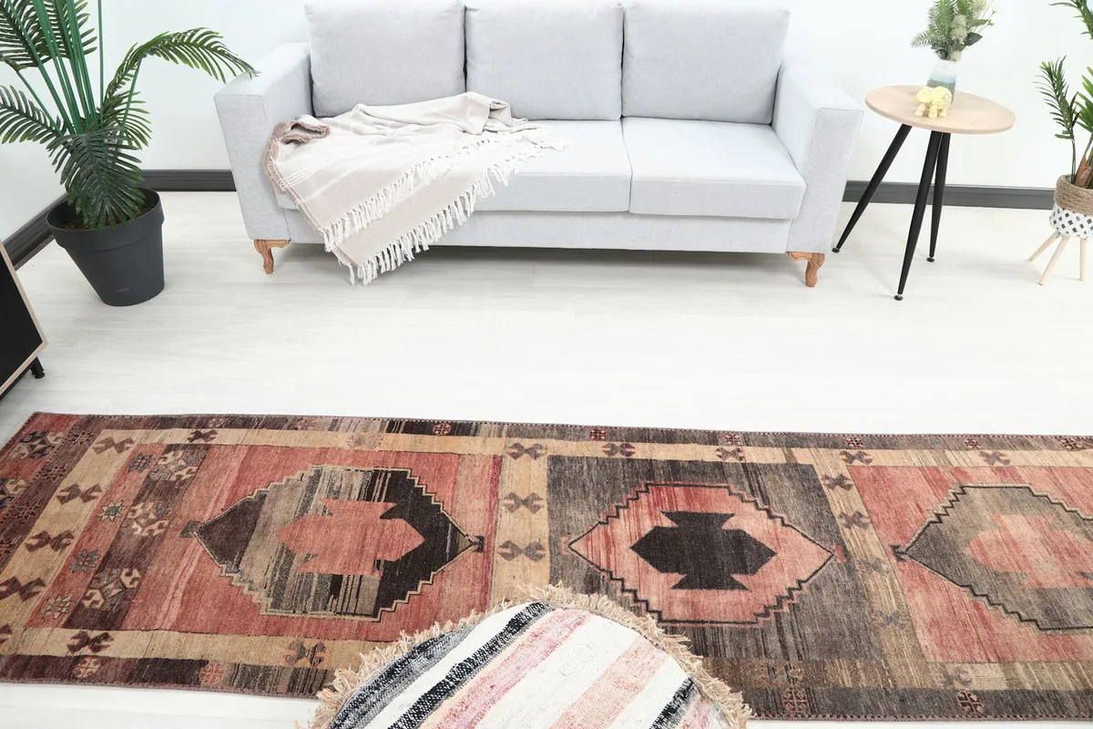 Overhead view of the runner rug in a room, showcasing the full pattern and color variations