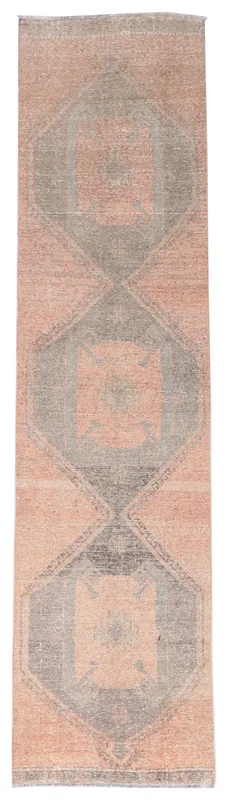 Full top view of the 3x12 muted rose and gray geometric Anatolian runner on a white background.